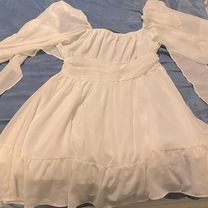 Sweet, romantic, tie back dress.